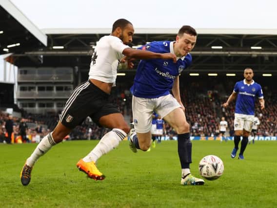 Oldham defenderGeorge Edmundson.