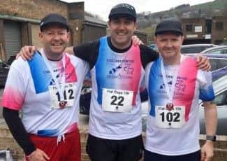 Aaron Parmar (middle) was joined in the 10k run by Ian Simpson (left) and Chloe's dad Mark (right)