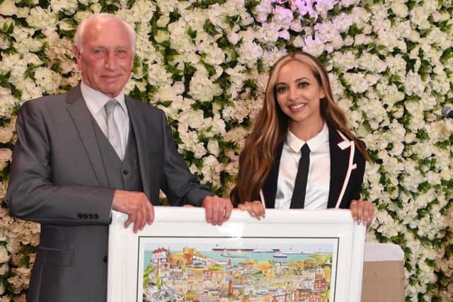 Bob Olley and Jade Thirlwall with the personalised artwork. Picture: Craig Leng Photography.