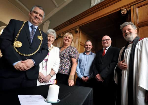 The Mayor Coun Ken Stephenson and Mayoress Mrs Cathy Stephenson attending Workers Memorial Day service held at South Shields Town Hall, with left to right, Unison rep Janet Green, Martin Smithwhite, GMB rep Tom Hunter, and Rev Charles James.