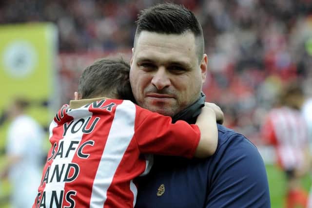Carl Lowery with son Bradley.
