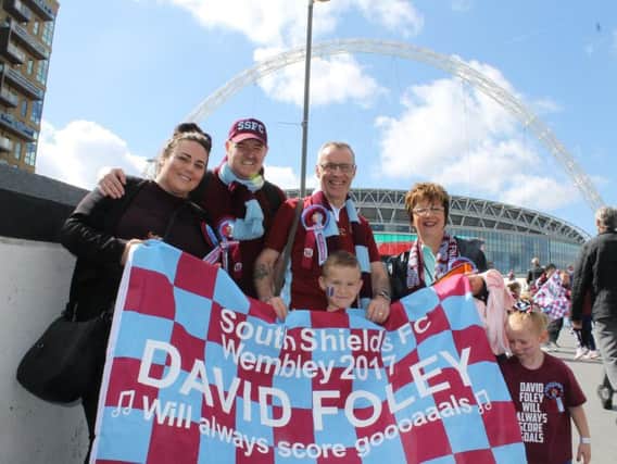 South Shields FC fans with their flags and banners at Wembley.