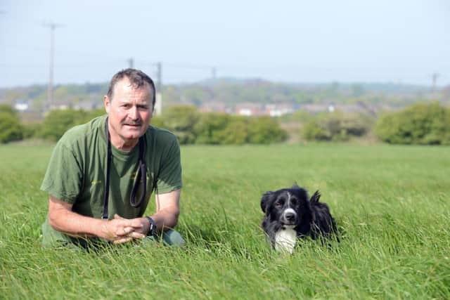 Peter Collins with dog Ted who found missing man George Dodds.