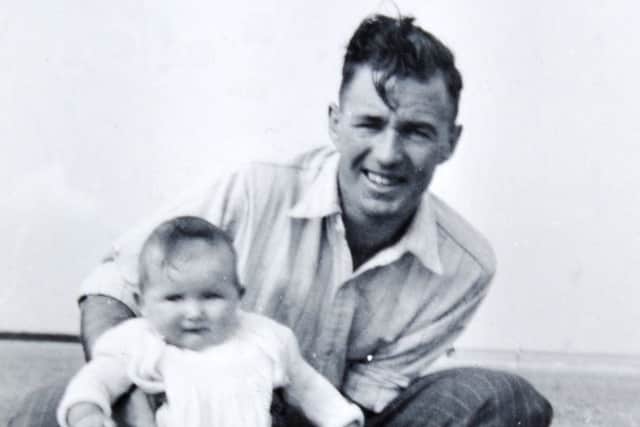 Ken with Susan when she was a baby