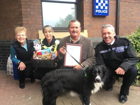 Georges wife Hele; PCSO Natalie Gibson; Peter Collins and Superintendent Paul Milner, with Ted