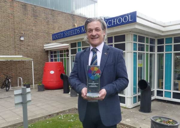 South Shields Marine School Principal John Roach with the award