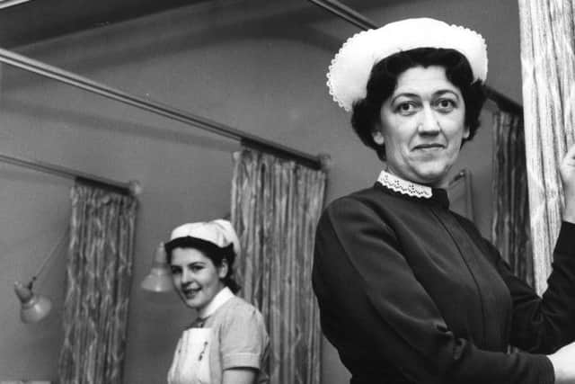 Back in  Janaury 1965  Miss N Collingwood, assistant matron at the Ingham Infirmary, switches on the background music which has been installed for a trial period.