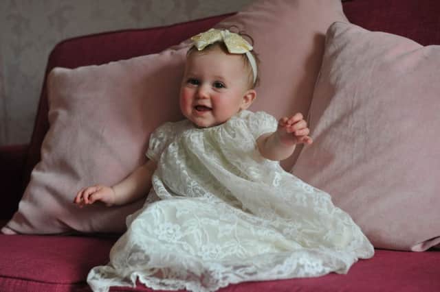 Gracie Wilkinson will be getting christened in a 100 year old christening gown.