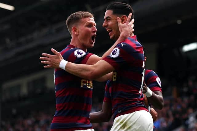 Matt Ritchie congratulates Ayoze Perez, right.