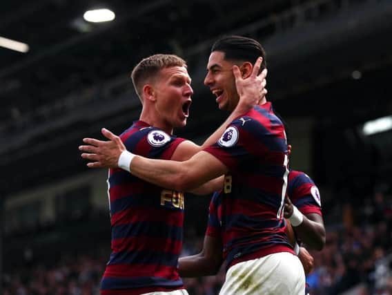 Matt Ritchie congratulates Ayoze Perez, right.