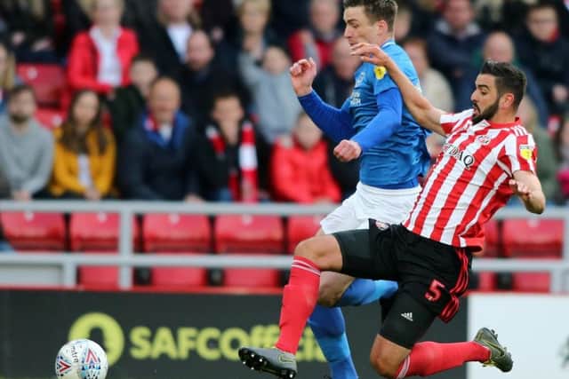 Sunderland defender Alim Ozturk will be available to face Portsmouth on Thursday night.