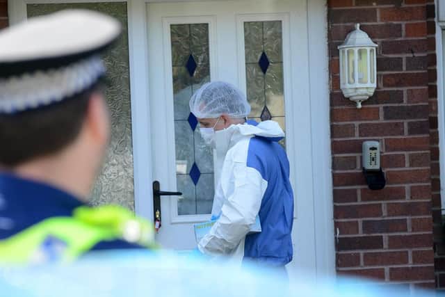 Forensic officers at a house in High Street, Jarrow, after a man's body was discovered on Tuesday.