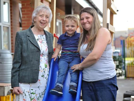 Councillor Moira Smith is pictured with Victoria Wallace and son Oden.