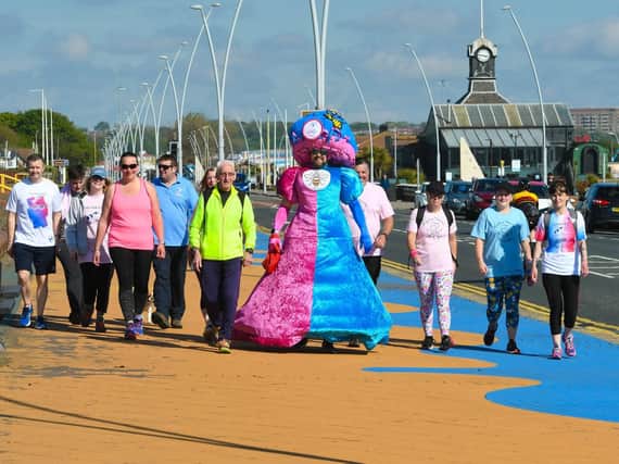 Colin Burgin-Plews and others take part in a charity walk around Bents Park in aid of the Chloe and Liam Together Forever Trust.