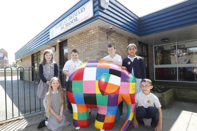 Year 4 pupils at Hadrian Primary School with the Elmer the Elephant statue