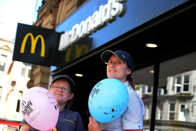 Pink and blue day for Chloe Rutherford and Liam Curry at McDonalds, King Street, South Shields with staff Cheryl Myers and shift manager Dawn Urwin (R)