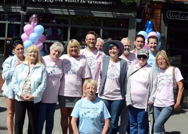 Pink and blue day for Chloe Rutherford and Liam Curry at Ziggys Bar, Prince Georg Square, South Shields with staff and customers
