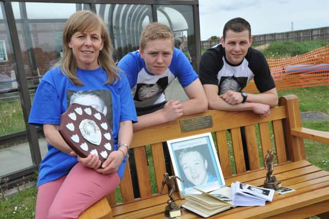 Aaron's mum Karen Rutter with sons Peter and Ronnie