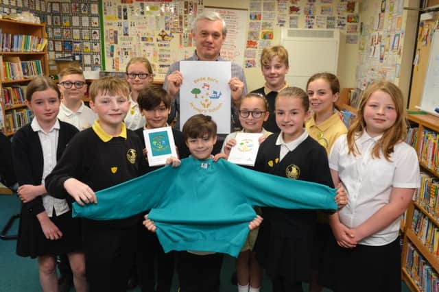 Bede Burn Primary School is to introduce a new uniform with artwork designed by parent David O'Malley.