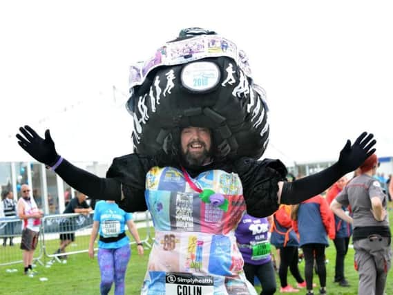 Colin Burgin-Plews, aka the Big Pink Dress, in his latest handcrafted creation after completing the Great North Run 2018.