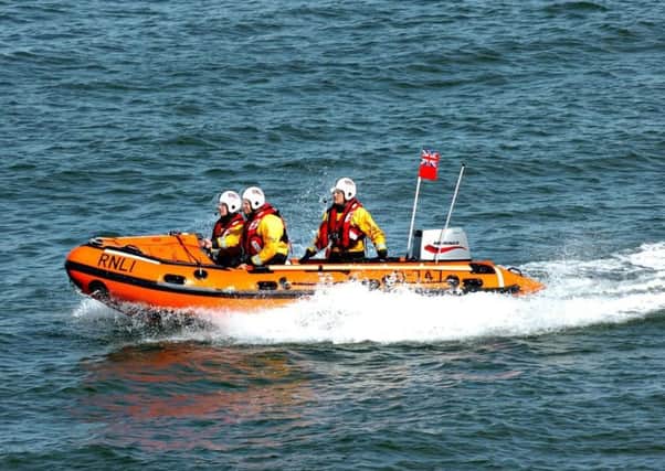RNLI volunteers out on the water.