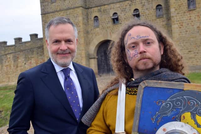 The director of the British Museum, Dr Hartwig Fischer, meets a native Briton at Arbeia Roman Fort in South Shields.