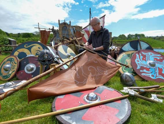Props team leader Mark Rossi inspects some of the 3,000 weapons, shields and helmets used in the production of Kynren - an epic tale of England. Pic: North News.