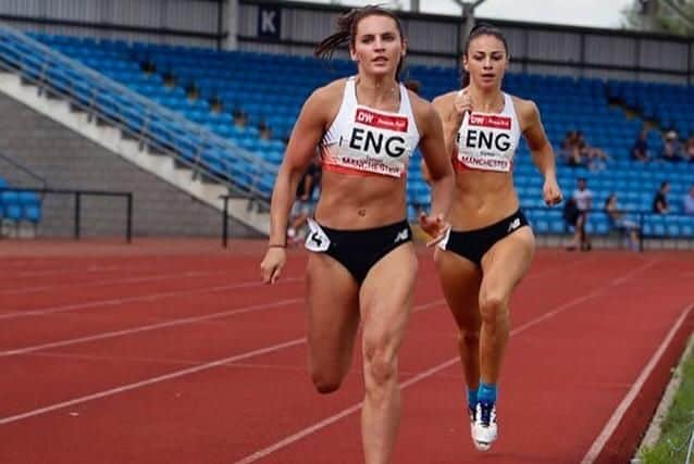 Lucy Turner (left) on the track