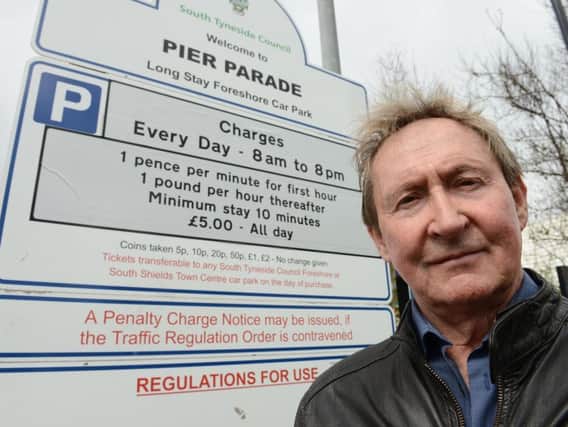 Colin Campbell next to the car parking charge board located in the Pier Parade car park South Shields.