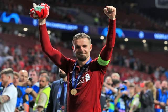 Liverpool's Jordan Henderson celebrates after winning the UEFA Champions League Final at the Wanda Metropolitano, Madrid. Picture by Peter Byrne/PA Wire.