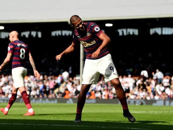 Salomon Rondon of Newcastle United celebrates after scoring his team's fourth goal during the Premier League match between Fulham FC and Newcastle United at Craven Cottage on May 12. (Photo by Alex Broadway/Getty Images)
