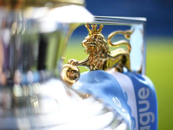 The Premier League Trophy on display prior to the Premier League match between Manchester City and Huddersfield Town at Etihad Stadium on May 6, 2018 in Manchester, England.  (Photo by Michael Regan/Getty Images)