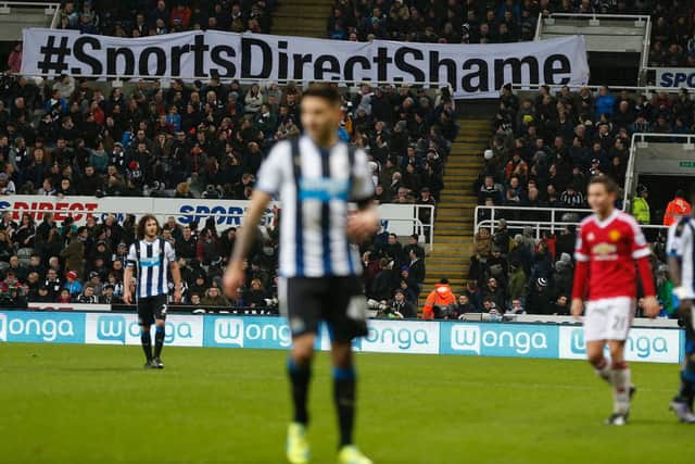 A banner protesting against Sports Direct