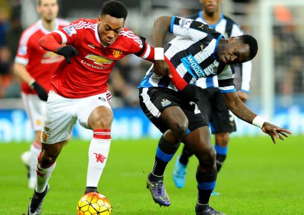 Newcastle United's Cheick Tiote in action against Manchester United