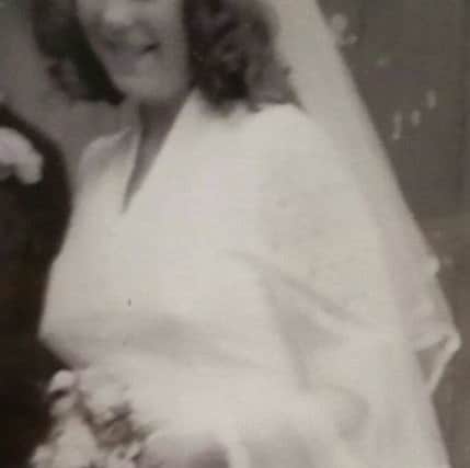 Alison Berry on her wedding day, June 24, 1978. She can fit into the dress again.