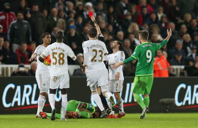Graham Scott sends off Kyle Naughton