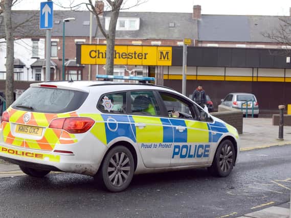 Police at Chichester Metro Station yesterday.