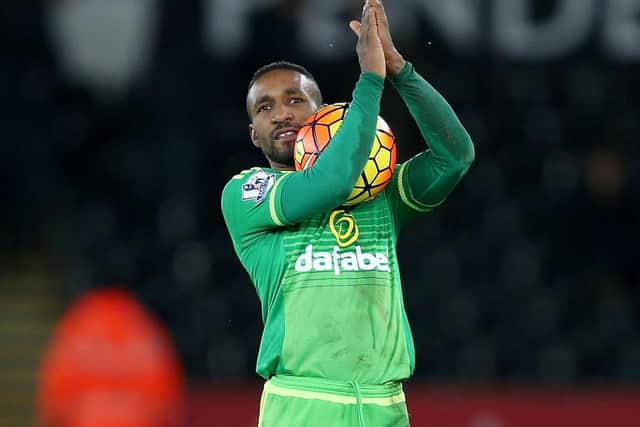 Jermain Defoe with the match ball after his hat-trick against Swansea City