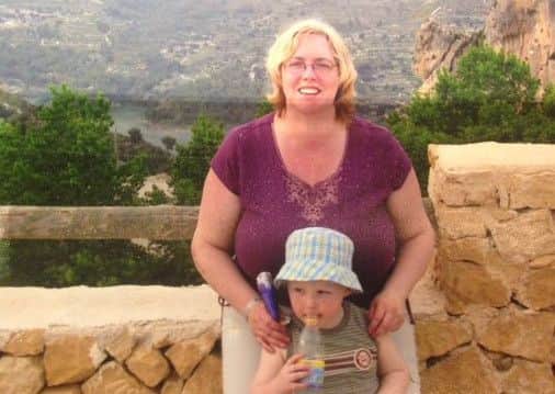 Before: Sharon on holiday with son Joe in Majorca in 2004.