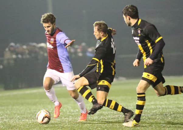 Adam Sakr of South Shields (left) takes on Morpeth last night. Picture by Peter Talbot