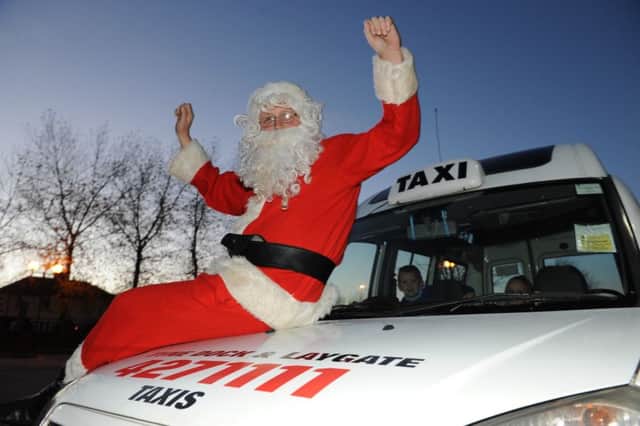 Taxi driving Santa Darren Murphy will be driving his taxi to raise money for St Clare's Hospice.