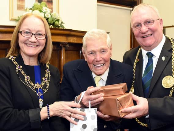 The Mayor of South Tyneside, Coun Richard Porthouse and his wife Patricia presenting Jim Purcell with his gifts.