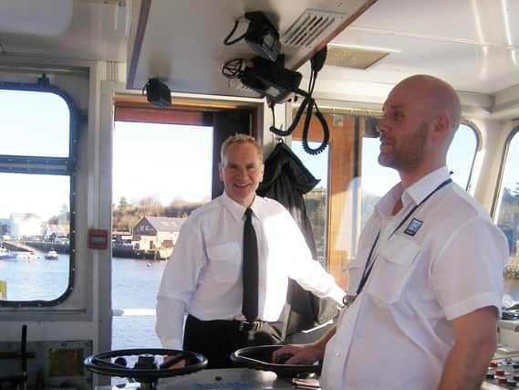 Chris McGuinness and David Purvis  on board the ferry.