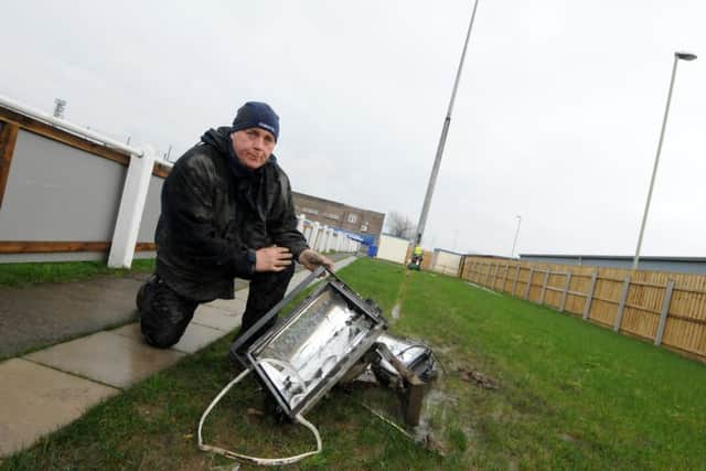 South Shields FC vice-chairman Gary Crutwell with the floodlight tower which blew over during strong winds.