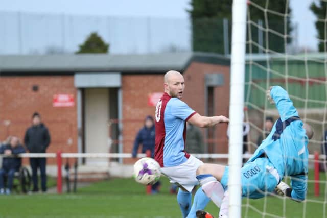 Lewis Teasdale sees an effort go close for South Shields against Ryhope CW. Image by Peter Talbot.
