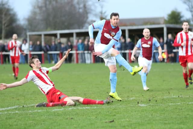 Warren Byrne goes for goal against Ryhope CW. Image by Peter Talbot.