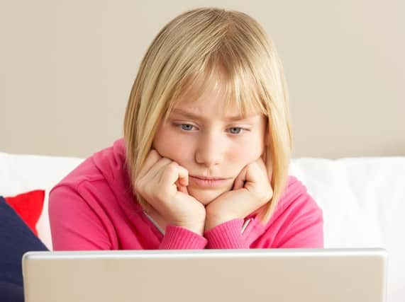 Children now spend longer each day online than watching TV.
