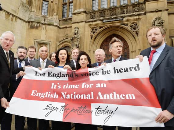 Politicians sing Jerusalem, as they launch the English National Anthem E-petition, outside the Houses of Parliament in London. Picture: John Stillwell/Press Association.