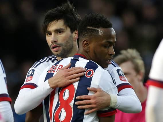 Berahino is congratulated after scoring for West Brom in the FA Cup yesterday.