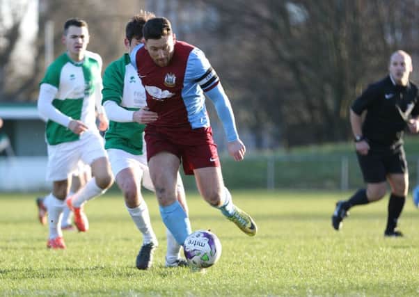 Leepaul Scroggins in action against Billingham Synthonia. Image by Peter Talbot.